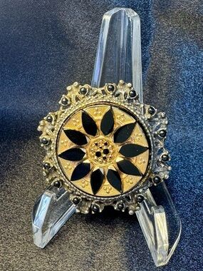 Vintage Gold Tone Sunburst Brooch with Black Enamel Petals